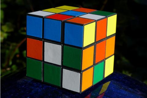 The cube. The French for "the cube" is "le cube".