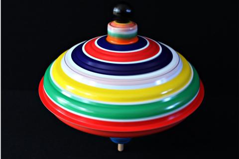 Some spinning tops. The French for "some spinning tops" is "des toupies". Some spinning tops. The French for "some spinning tops" is "des toupies".