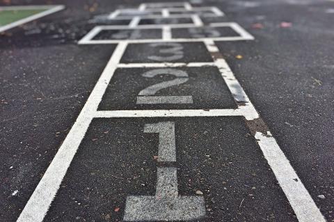 The hopscotch. The French for "the hopscotch" is "la marelle".