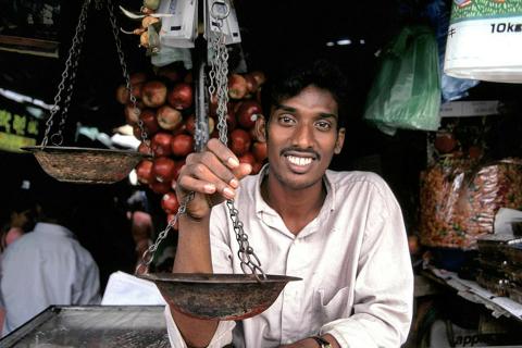 The merchant; the seller. The French for "the merchant; the seller" is "le marchand".