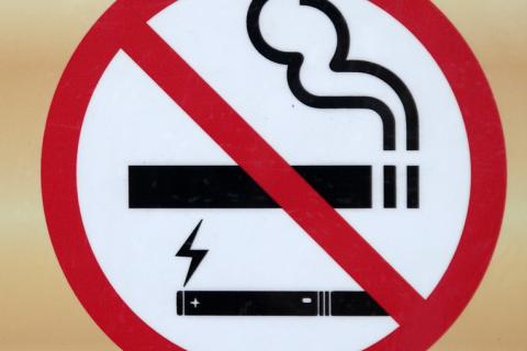 A No Smoking sign. The Thai for "a No Smoking sign" is "ป้ายห้ามสูบบุหรี่".