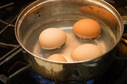 Hard-boiled egg. The Thai for "hard-boiled egg" is "ไข่ต้ม".