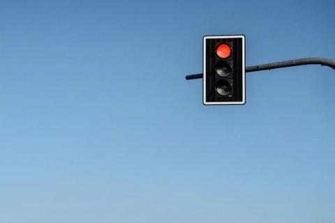 Red light. The Thai for "red light" is "ไฟแดง".