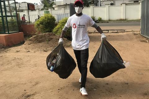 A man and two garbage bags. The Thai for "a man and two garbage bags" is "ผู้ชายและถุงขยะสองใบ". A man and two garbage bags. The Thai for "a man and two garbage bags" is "ผู้ชายและถุงขยะสองใบ".