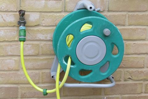 A tap with a hose. The Thai for "a tap with a hose" is "ก๊อกน้ำกับสายยาง". A tap with a hose. The Thai for "a tap with a hose" is "ก๊อกน้ำกับสายยาง".