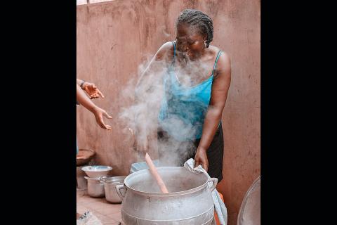 A woman cooking. The Thai for "a woman cooking" is "ผู้หญิงทำอาหาร". A woman cooking. The Thai for "a woman cooking" is "ผู้หญิงทำอาหาร".
