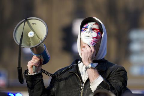 A protester with his megaphone. The Thai for "a protester with his megaphone" is "ผู้ประท้วงกับโทรโข่งของเขา". A protester with his megaphone. The Thai for "a protester with his megaphone" is "ผู้ประท้วงกับโทรโข่งของเขา".