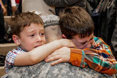 A soldier is saying goodbye to his children.. The Thai for "A soldier is saying goodbye to his children." is "ทหารกำลังบอกลาลูกๆของเขา". A soldier is saying goodbye to his children.. The Thai for "A soldier is saying goodbye to his children." is "ทหารกำลังบอกลาลูกๆของเขา".